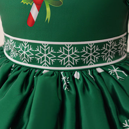 Festive Green Snowflake Dress with Candy Cane Accent